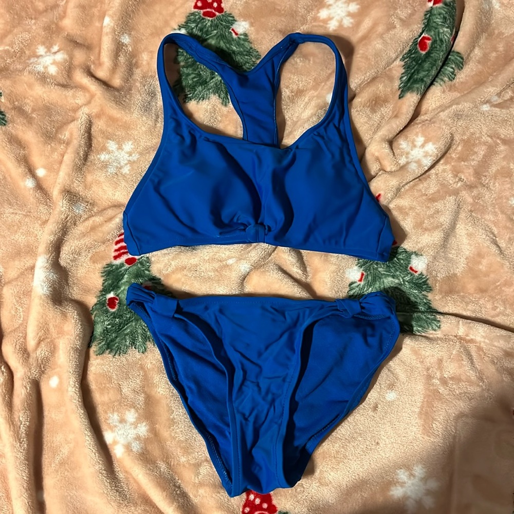 blue swim suit worn once! great quality cute knot detail on top!